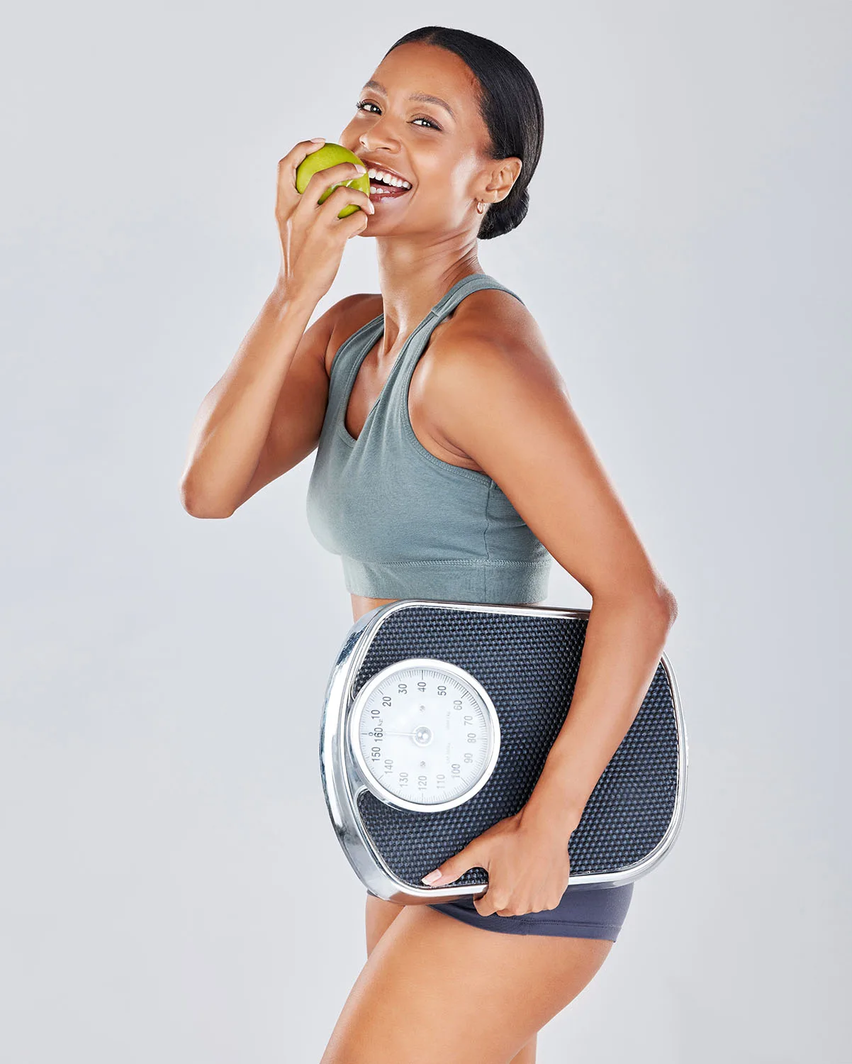 portrait scale and black woman eating apple on di 2023 11 27 05 02 34 utc